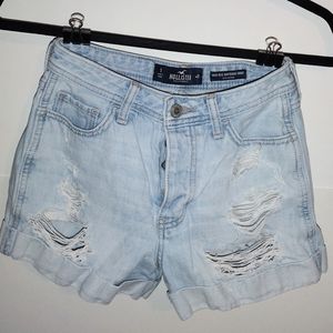 Hollister distressed light wash cuffed button fly jean/denim shorts. Size 1